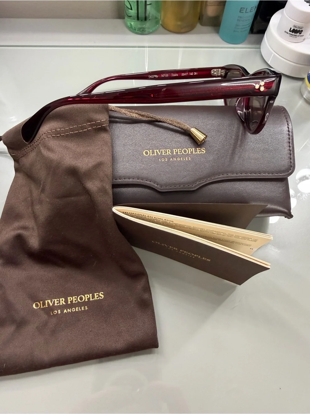 Oliver Peoples Burgundy Cat-Eye Sunglasses with Dark Smoke Lenses